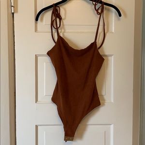 Super unique material body suit!